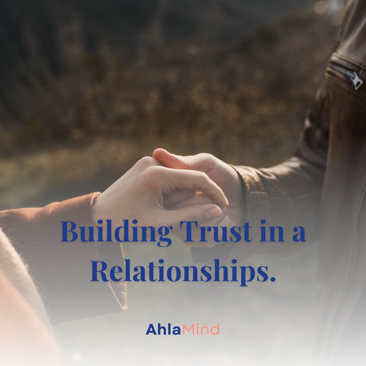 Two hands gently holding each other in black and white, symbolizing building trust in a relationship