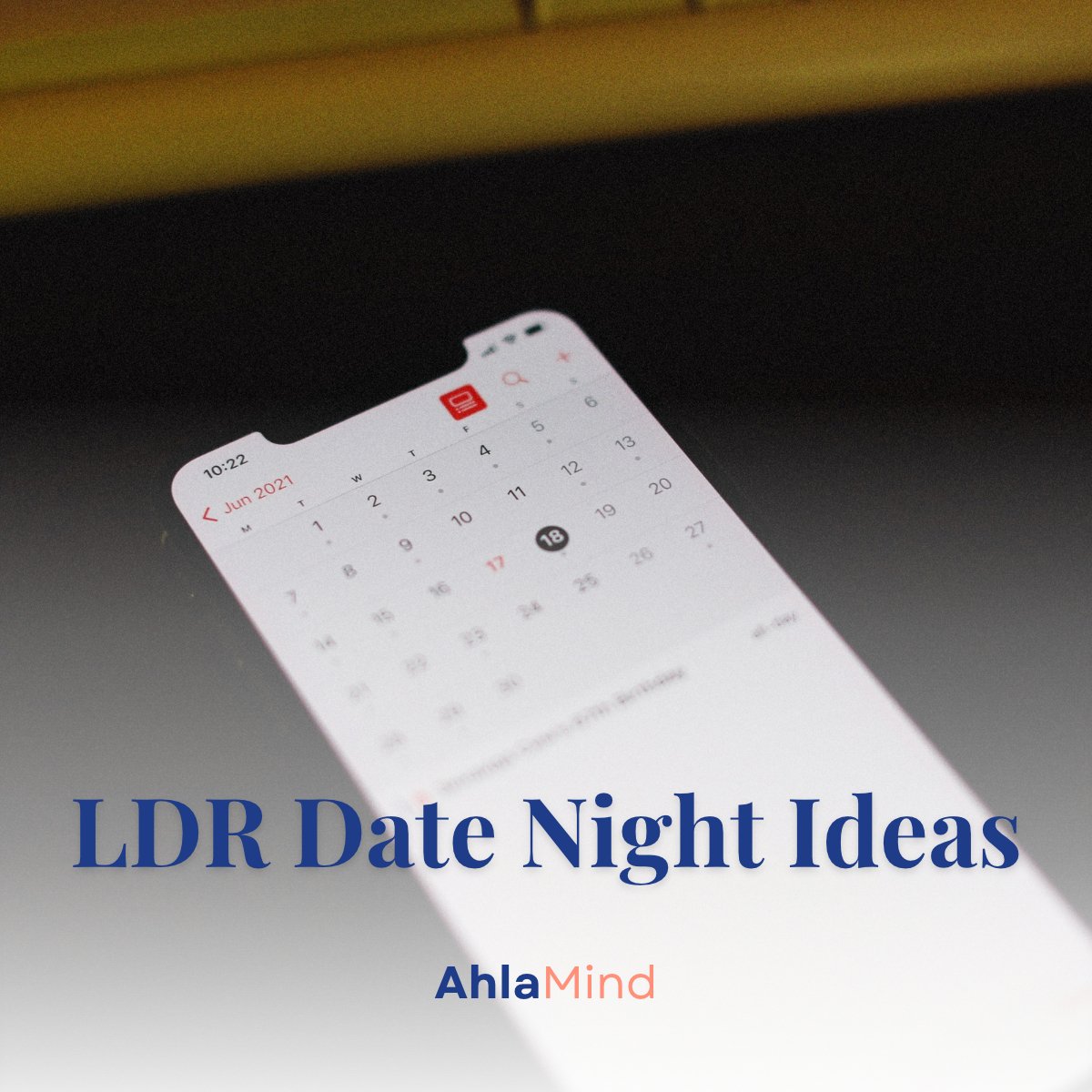 Phone calendar on a dark desk, a reminder to schedule long distance relationship date night ideas